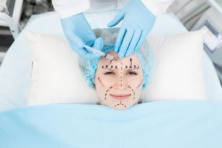 female having rejuvenating facial plastic surgery