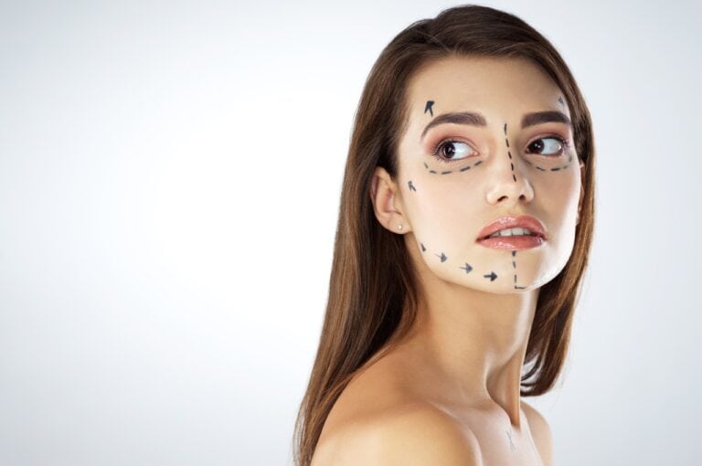 beautiful face of a woman with pen marks