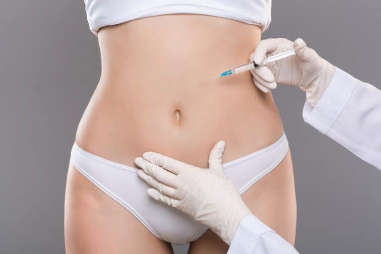 white woman having lipolysis injection