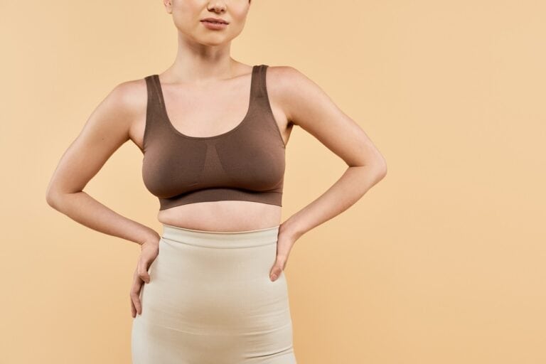 confident young woman wearing compression garment