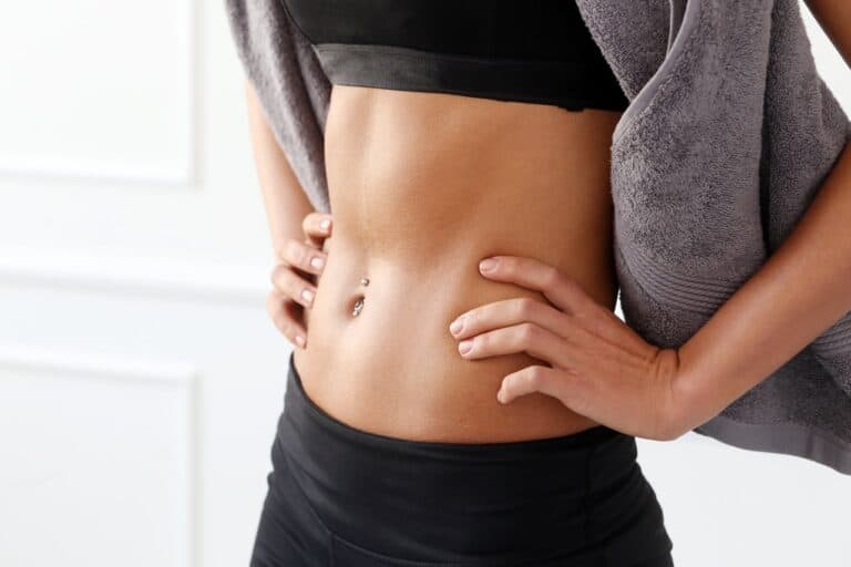 woman's flat tummy close up