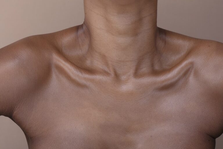 dark skinned woman close up of neck