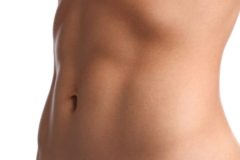 close up of a woman's toned abdomen