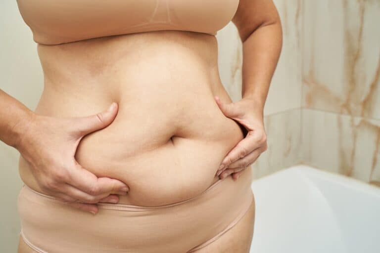 fat woman with big belly in brown underwear